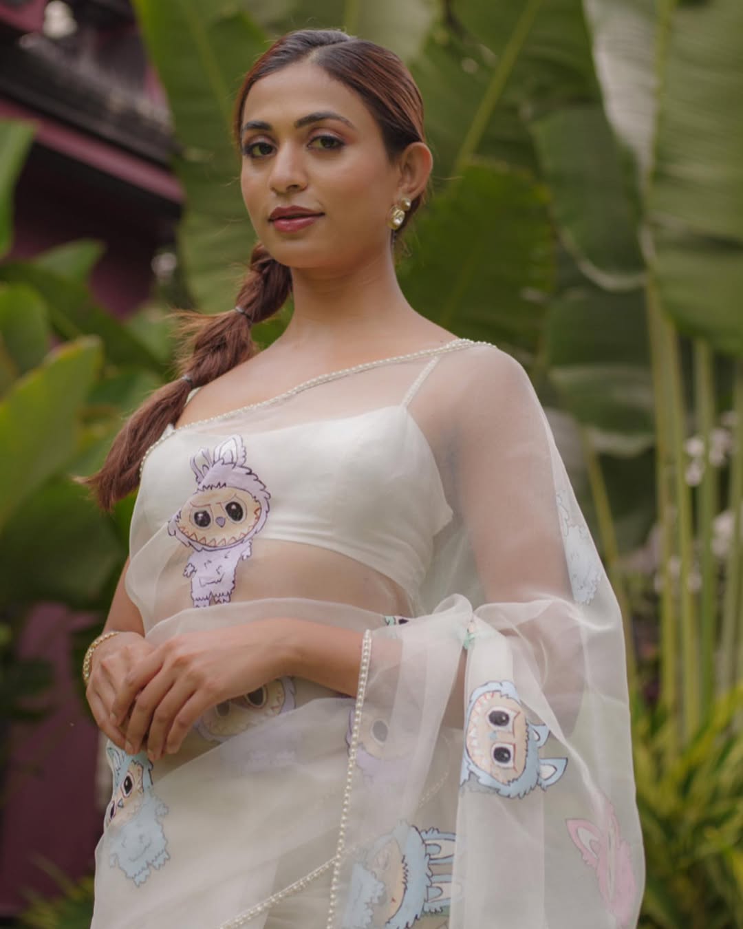 Dreamy Organza Cartoon Motif Saree. Crafted from lightweight and sheer premium organza fabric, this saree blends modern quirkiness with timeless charm.