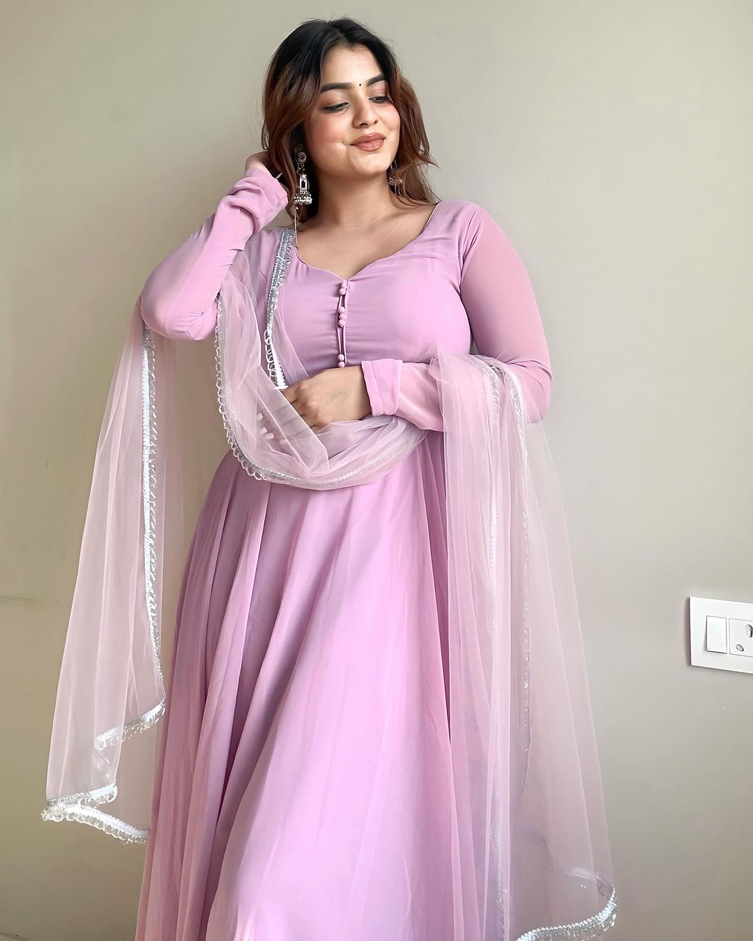 Kanak Mishra In Onion Color Anarkali Three Piece Suit